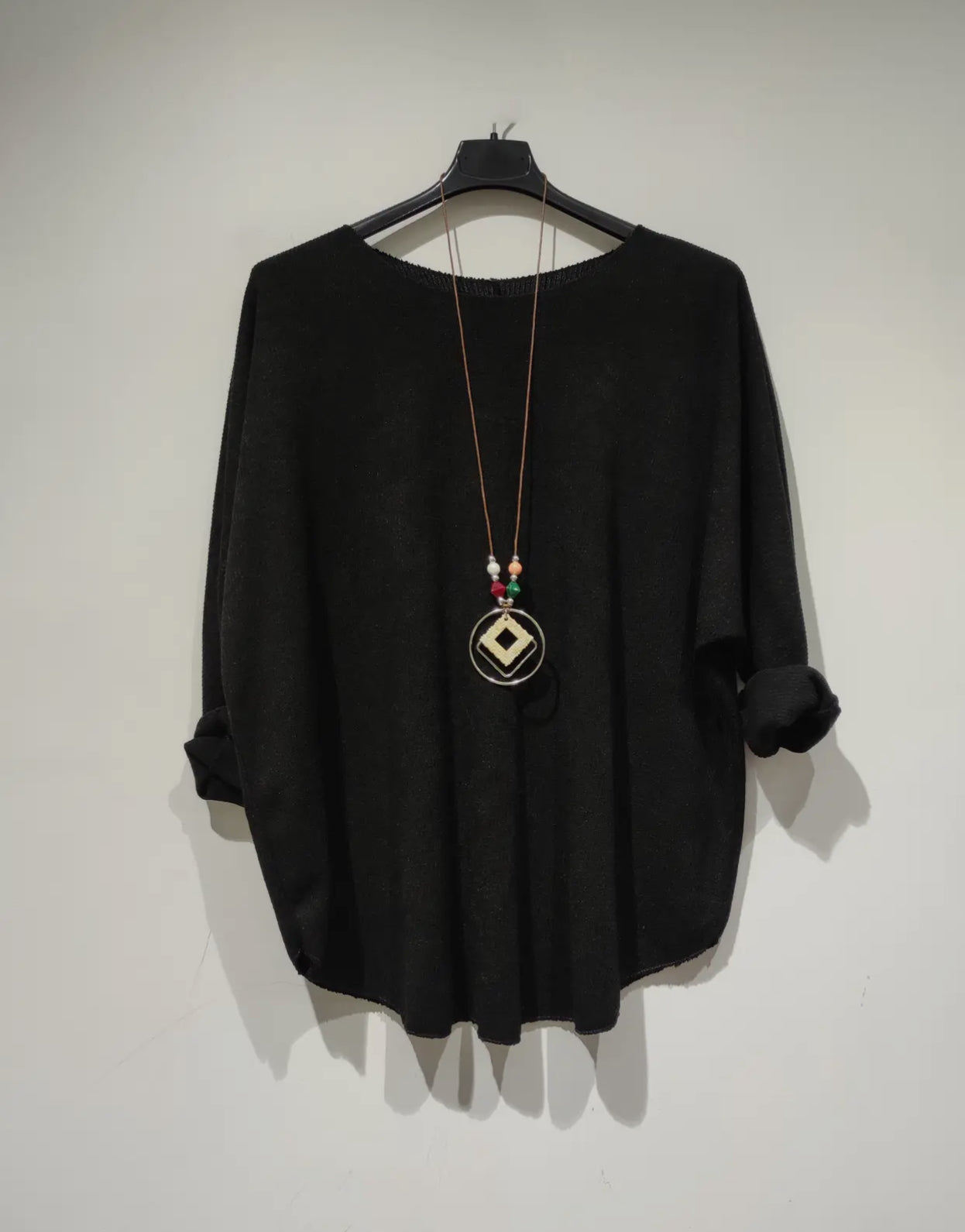 Maglia manica a pipistrello