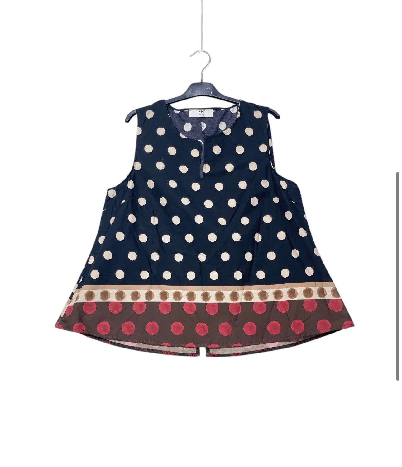 Blusa smanicata a pois