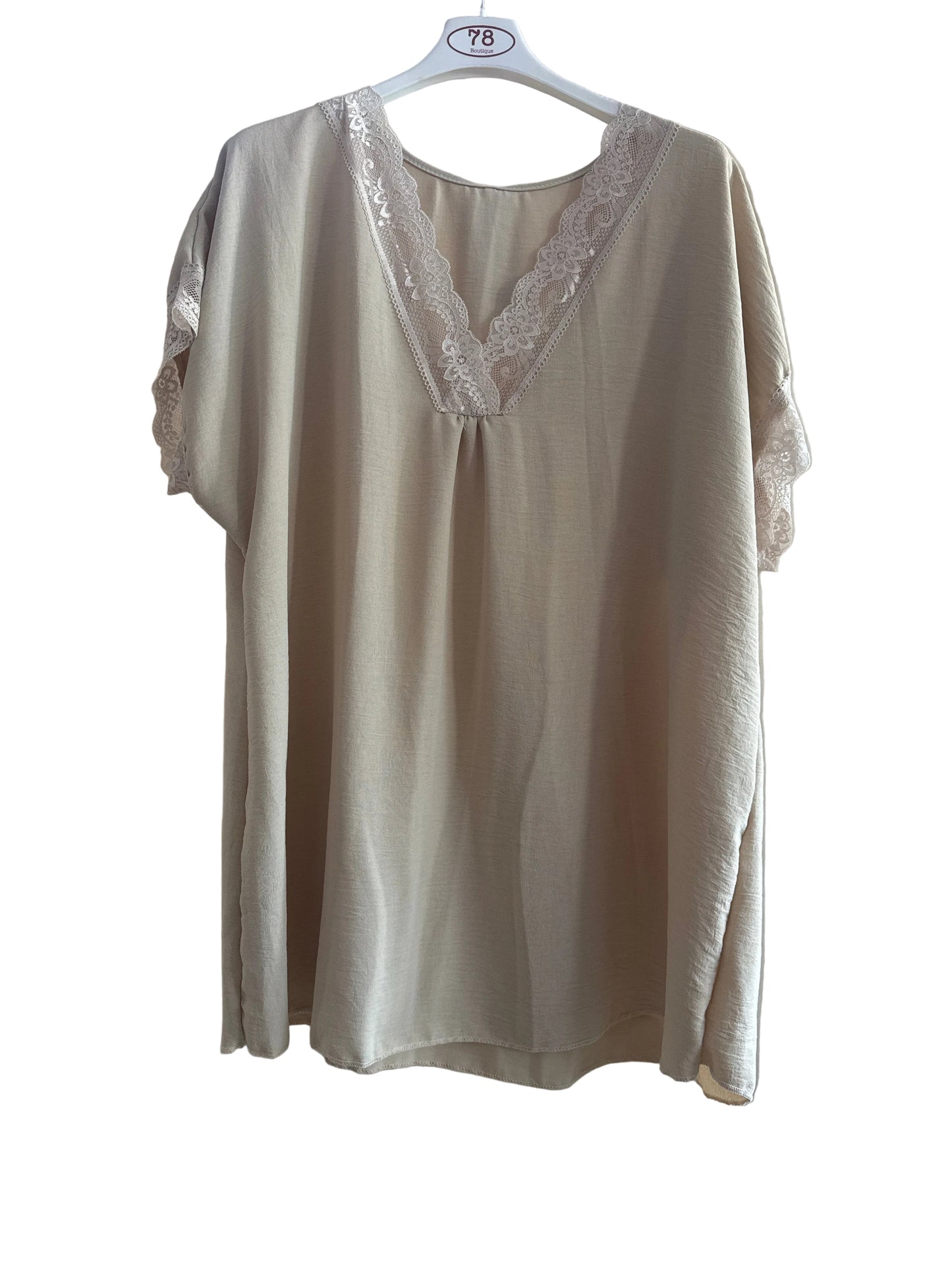 Blusa over con pizzo
