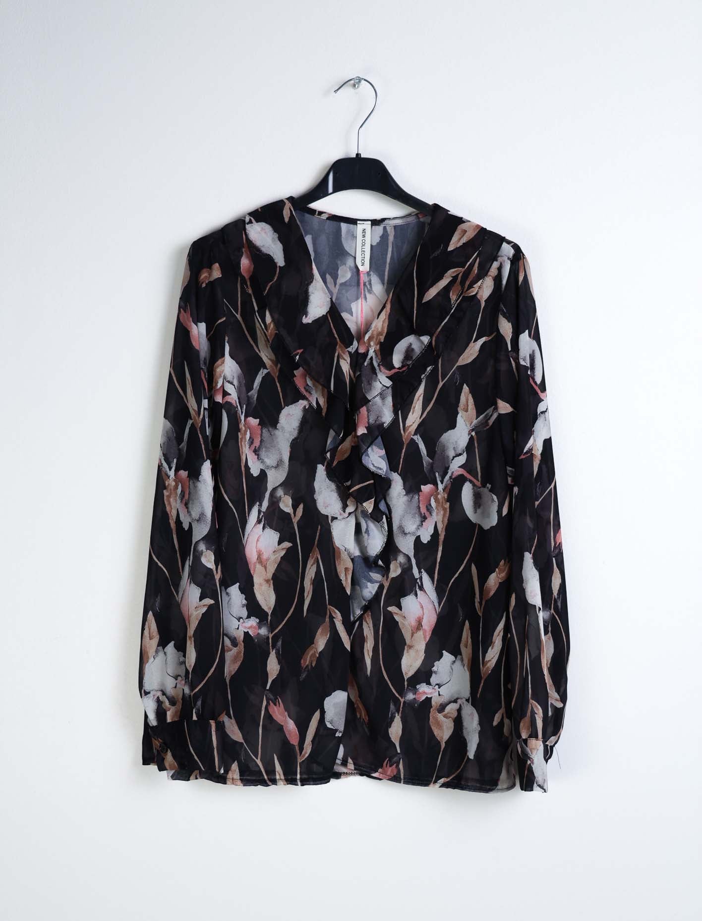 Blusa floreale con rouches