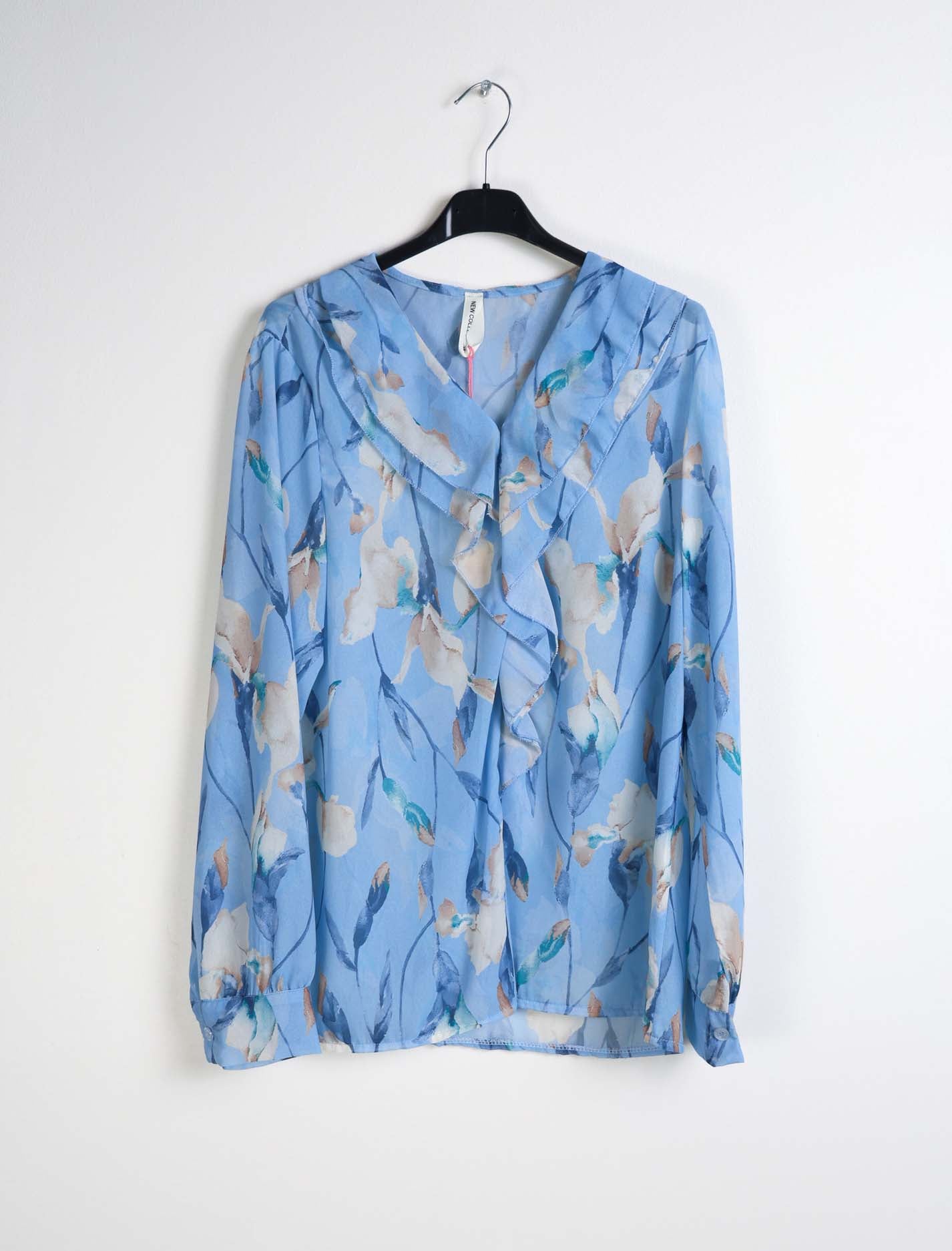 Blusa floreale con rouches
