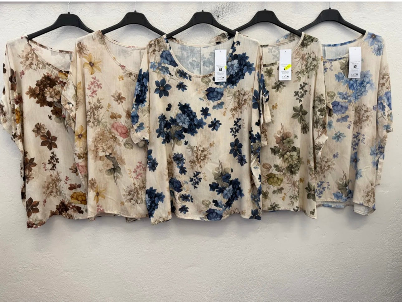 Blusa in viscosa con oblò