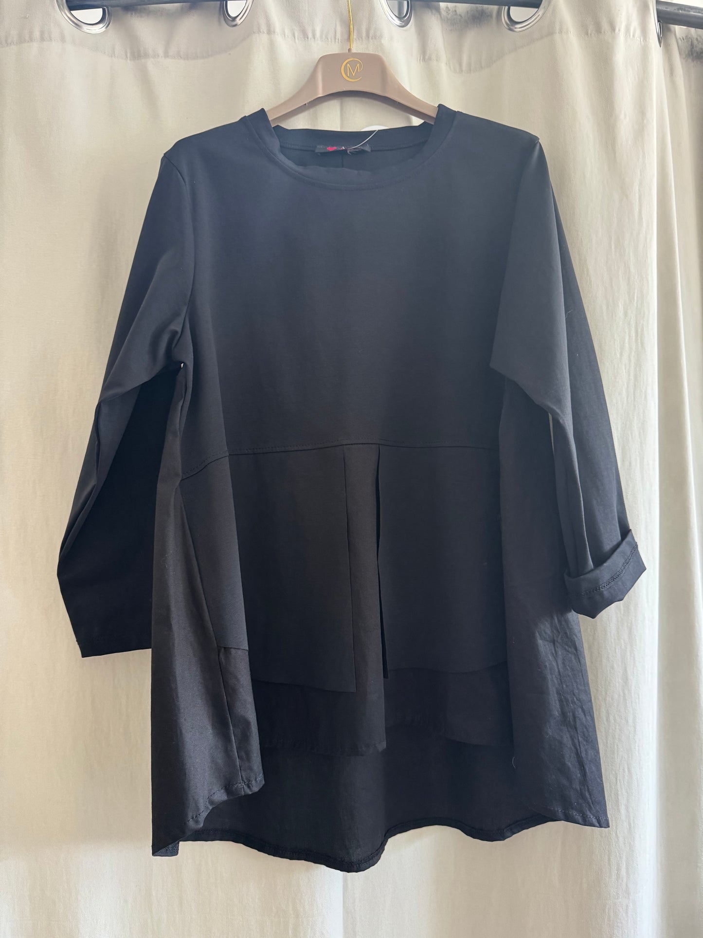 Maglia asimmetrica