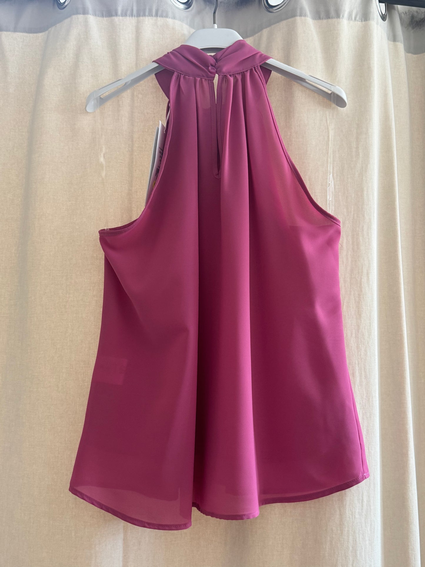 Top con rosa