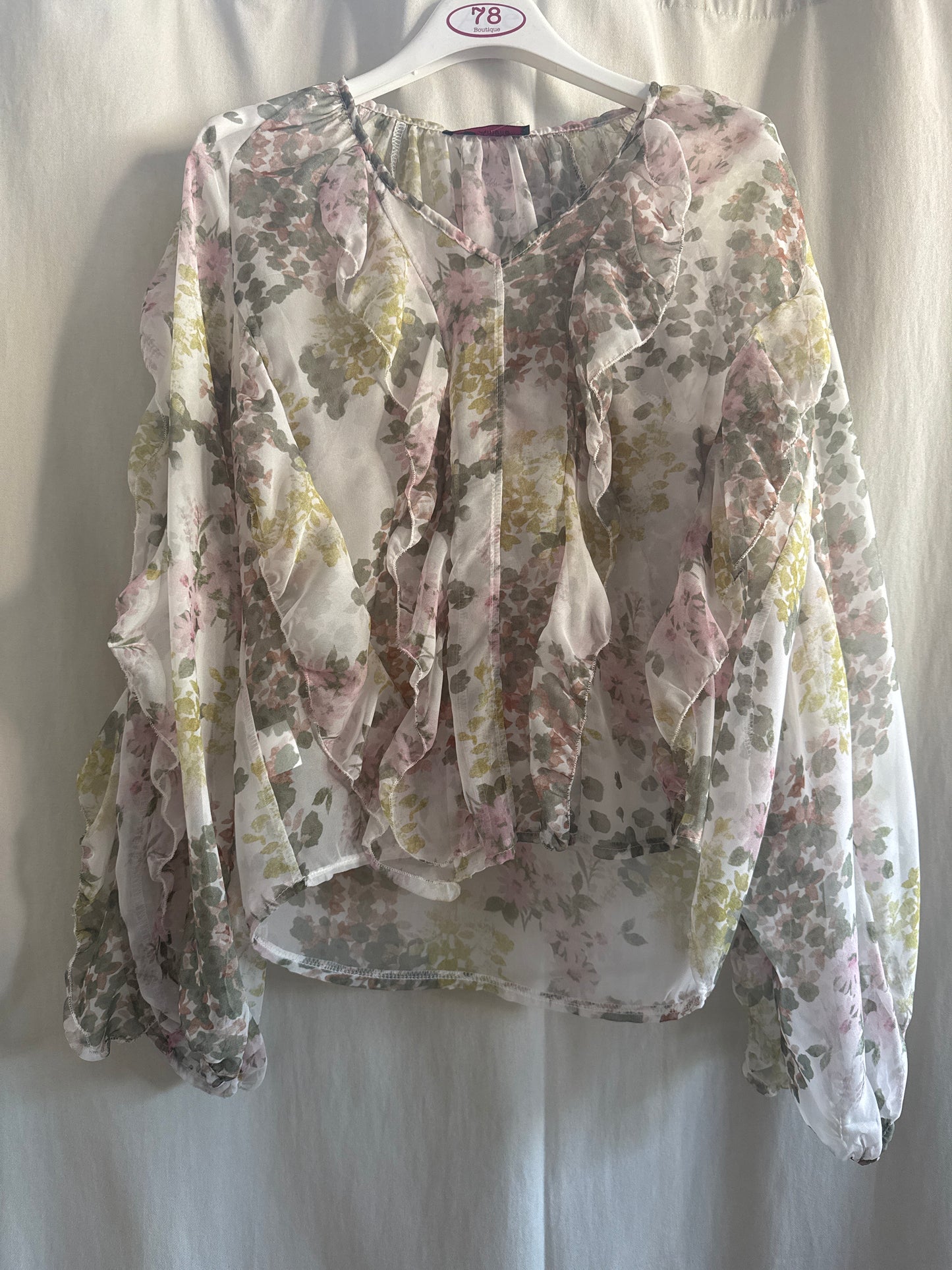 Blusa trasparente floreale