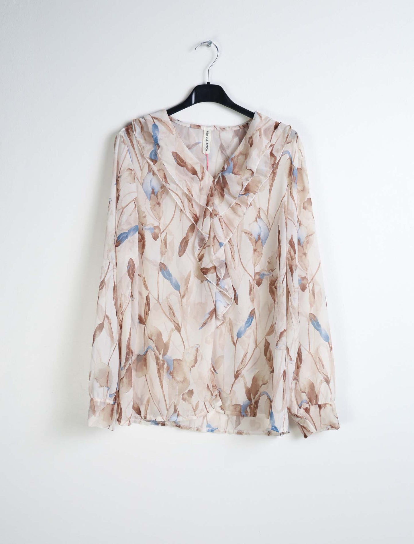 Blusa floreale con rouches