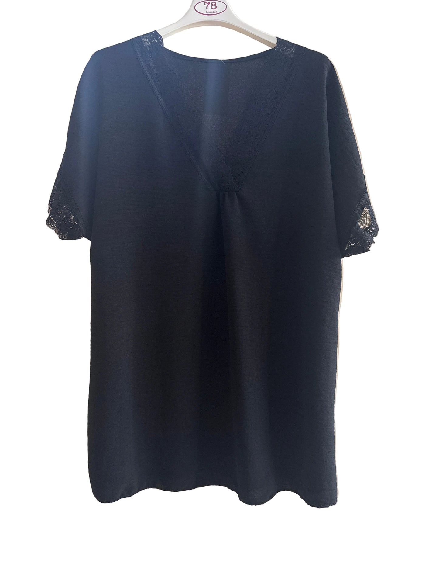 Blusa over con pizzo