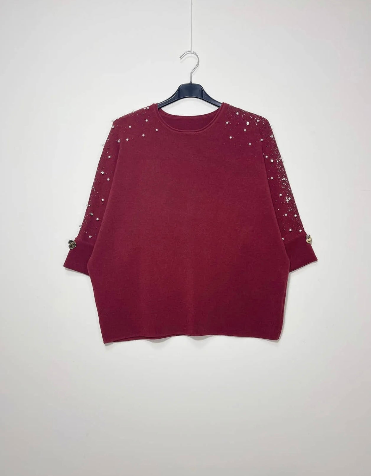 Maglia con applicazioni gioiello