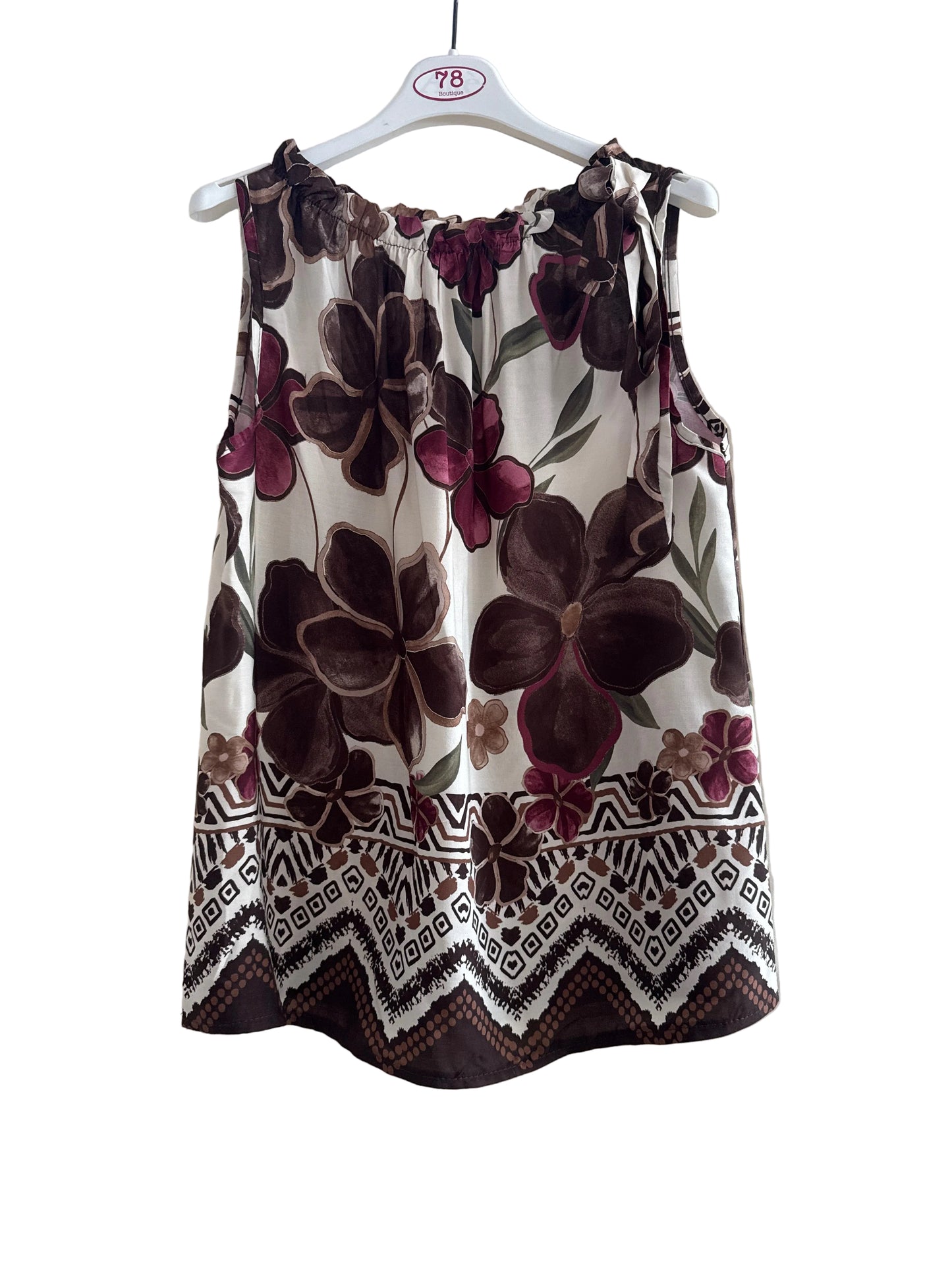Blusa smanicata con collo elastico