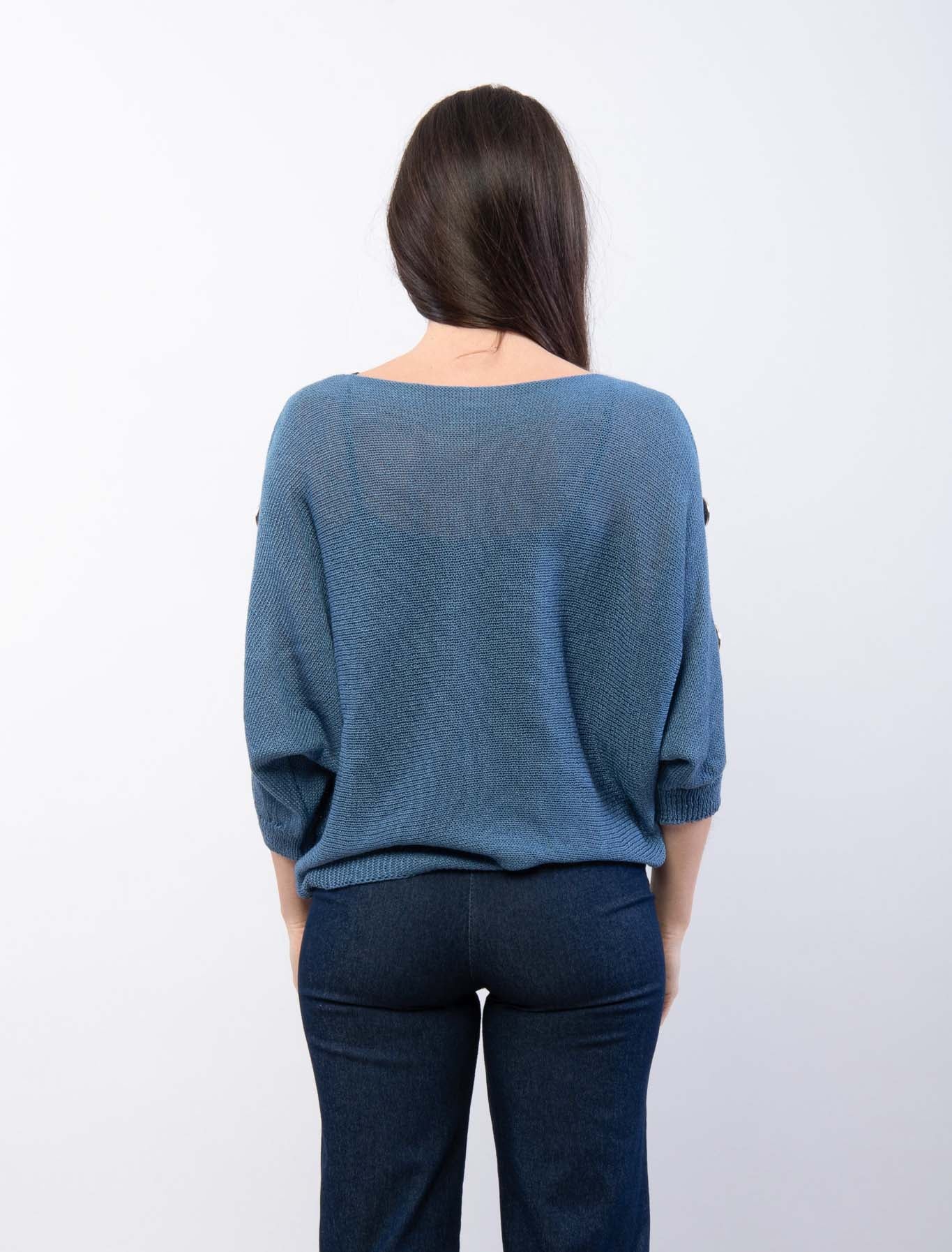 Maglia con spacchi sulle braccia