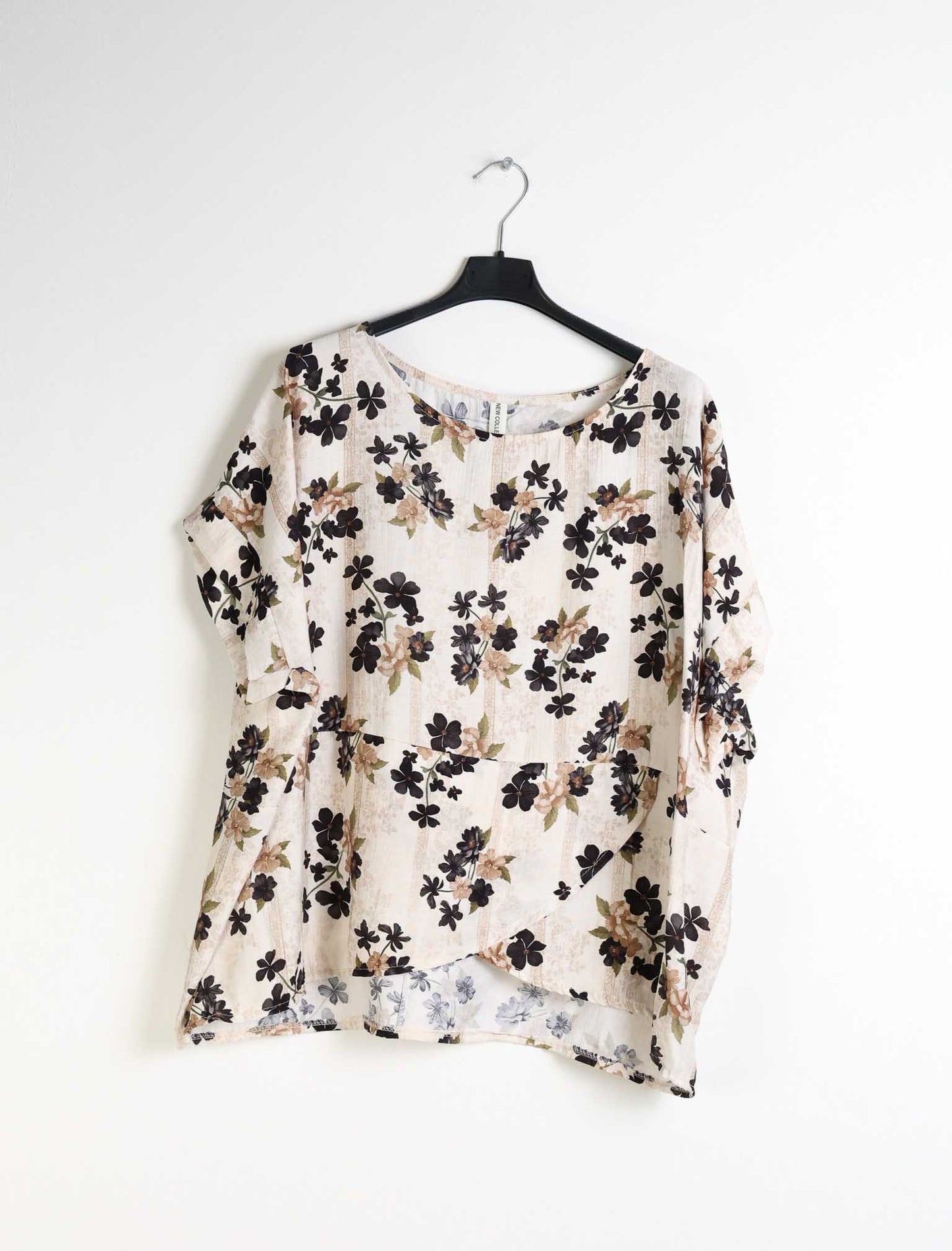 Blusa over floreale