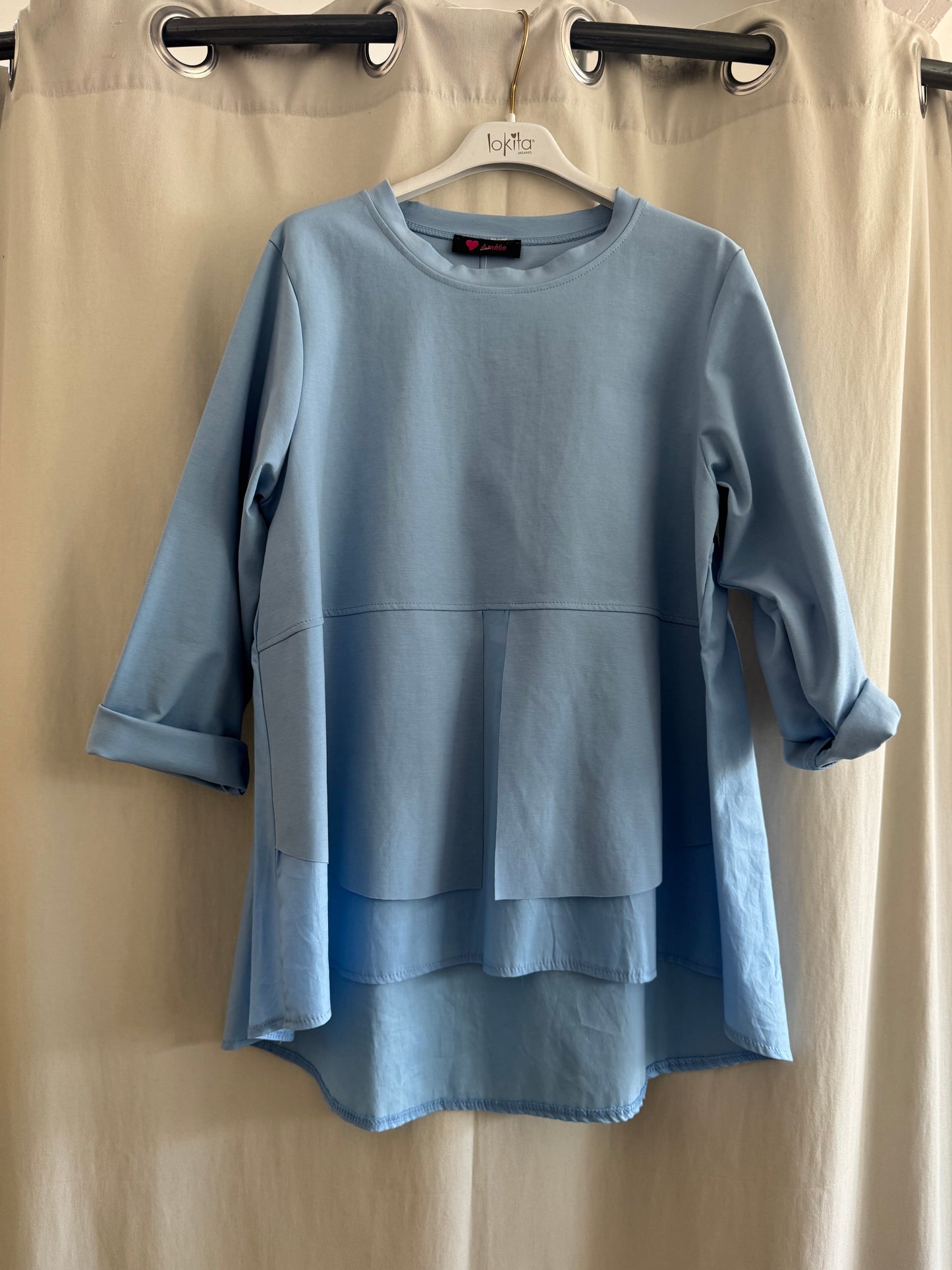 Maglia asimmetrica
