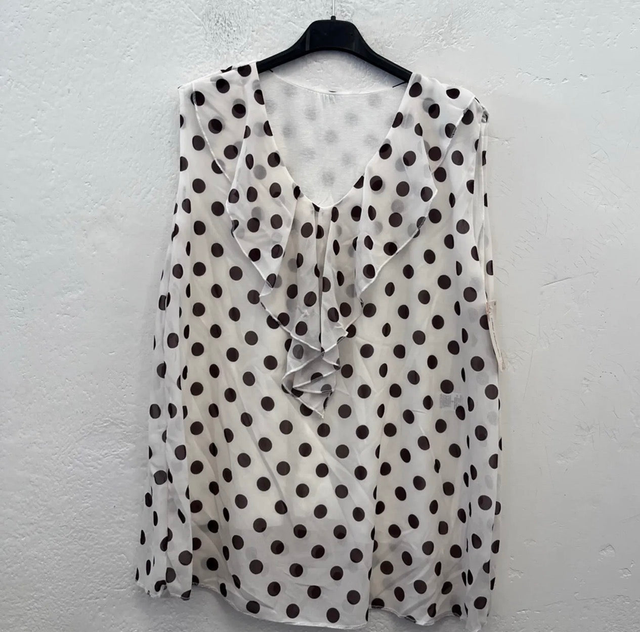 Blusa smanicata a pois