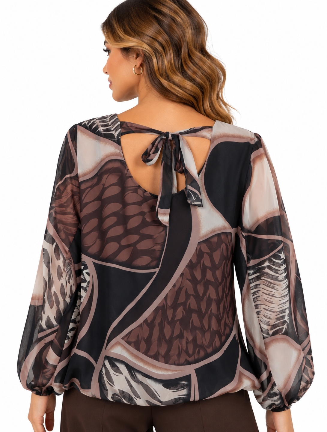 Blusa con fiocco posteriore